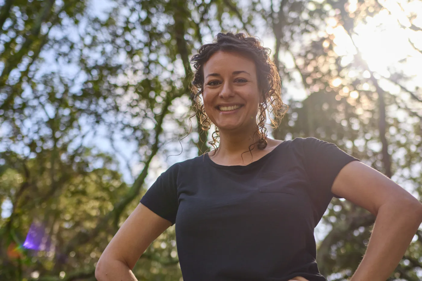 A woman outdoors planning confidently for her future